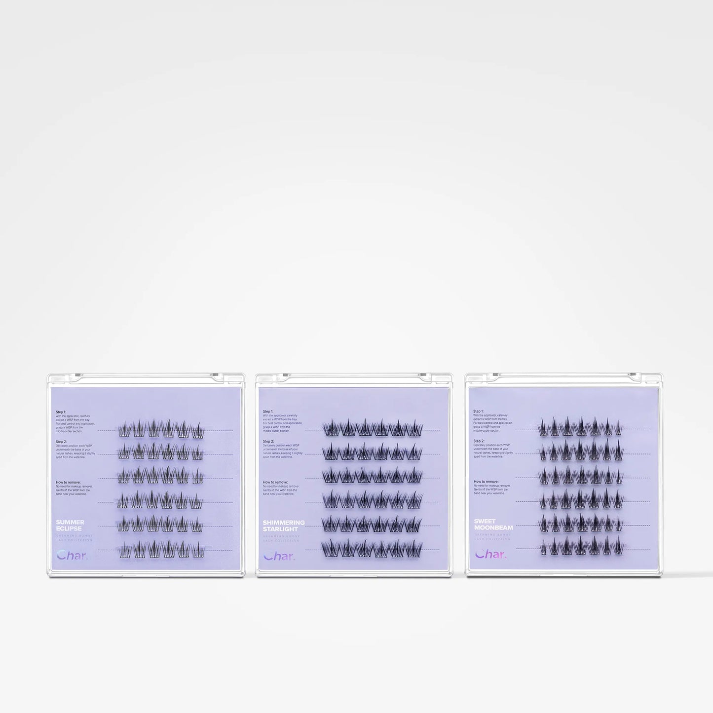 Three slim rectangular product boxes with white borders and pale lavender fronts are arranged side by side on a clean white background. Each box contains many small black-and-white illustrated figures or symbols arranged in rows.
