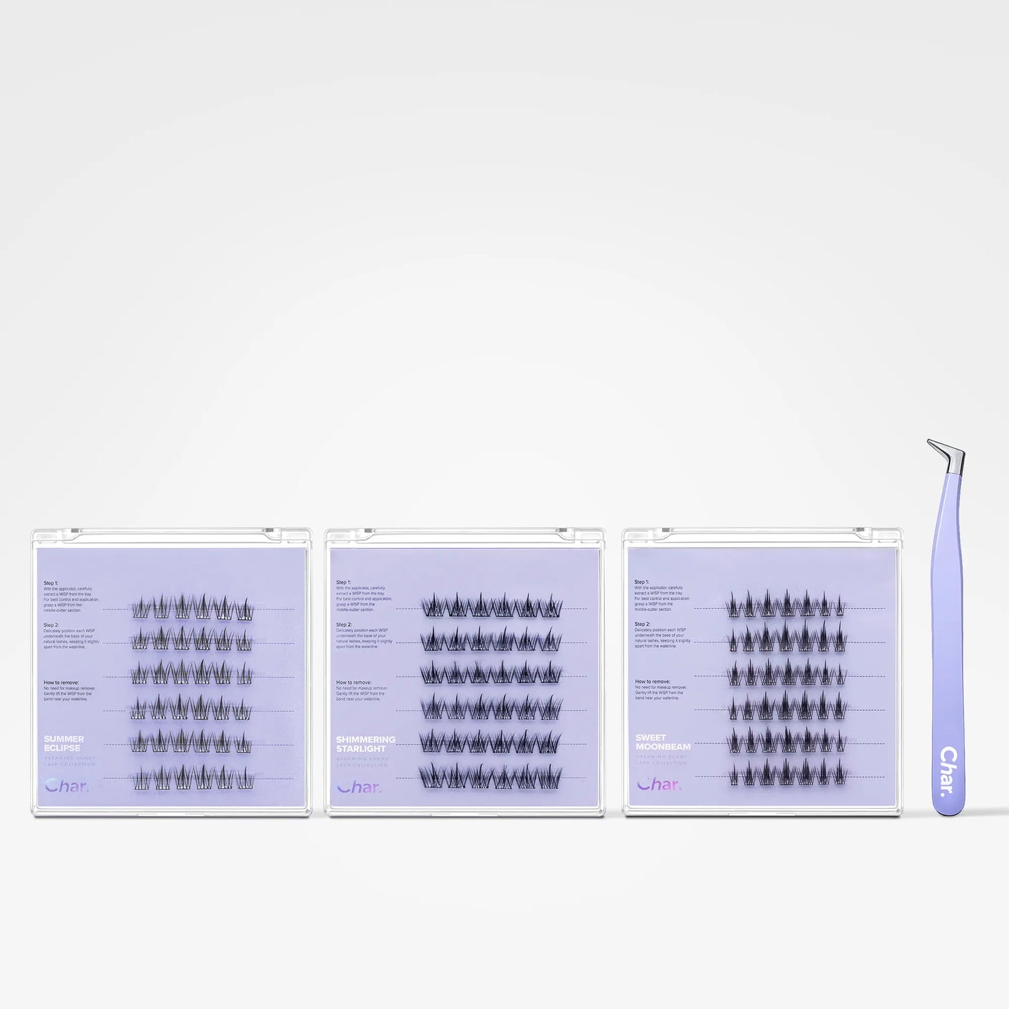 Three clear plastic lash extension trays filled with black false eyelash clusters, shown on a white background with a lavender tweezers tool standing to the right. The trays have a light lavender/purple tint.
