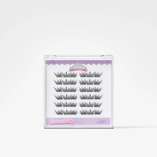 A package of false eyelashes on a white background. The clear plastic case contains ten pairs of black false eyelashes arranged in two columns of five.