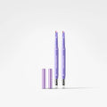 Two lavender lip gloss pens with dual applicator tips and a matching lavender cap, displayed on a clean white background.