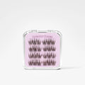 A pack of 12 false eyelash clusters in a clear plastic case with a light pink insert card labeled 'Dreamy Dozen'.