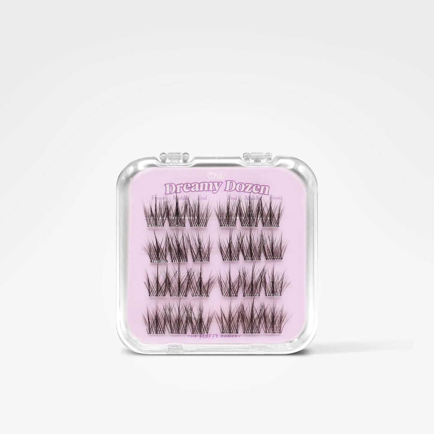 A pack of 12 false eyelash clusters in a clear plastic case with a light pink insert card labeled 'Dreamy Dozen'.