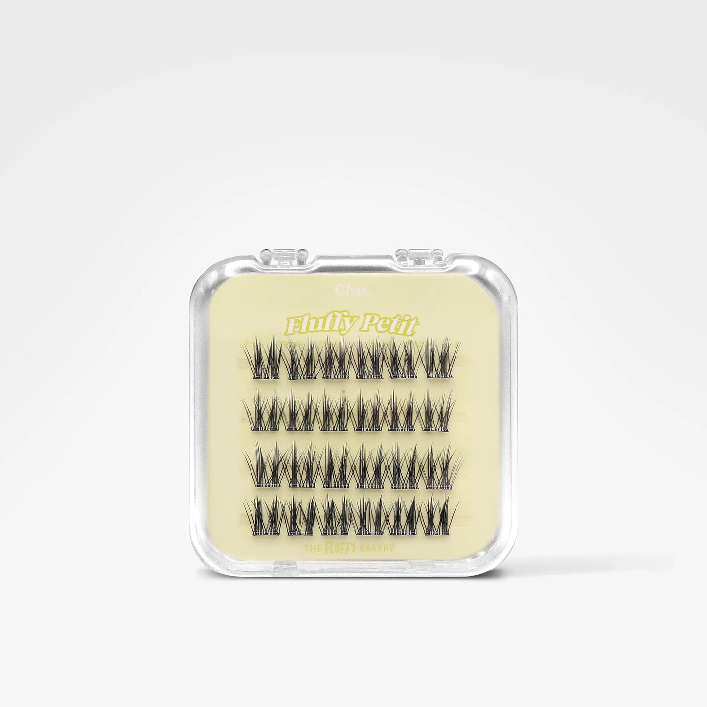 A small clear plastic case containing multiple pairs of black false eyelashes on a pale yellow insert, photographed on a clean white background. The insert shows the brand name 'Blinky Pets'.