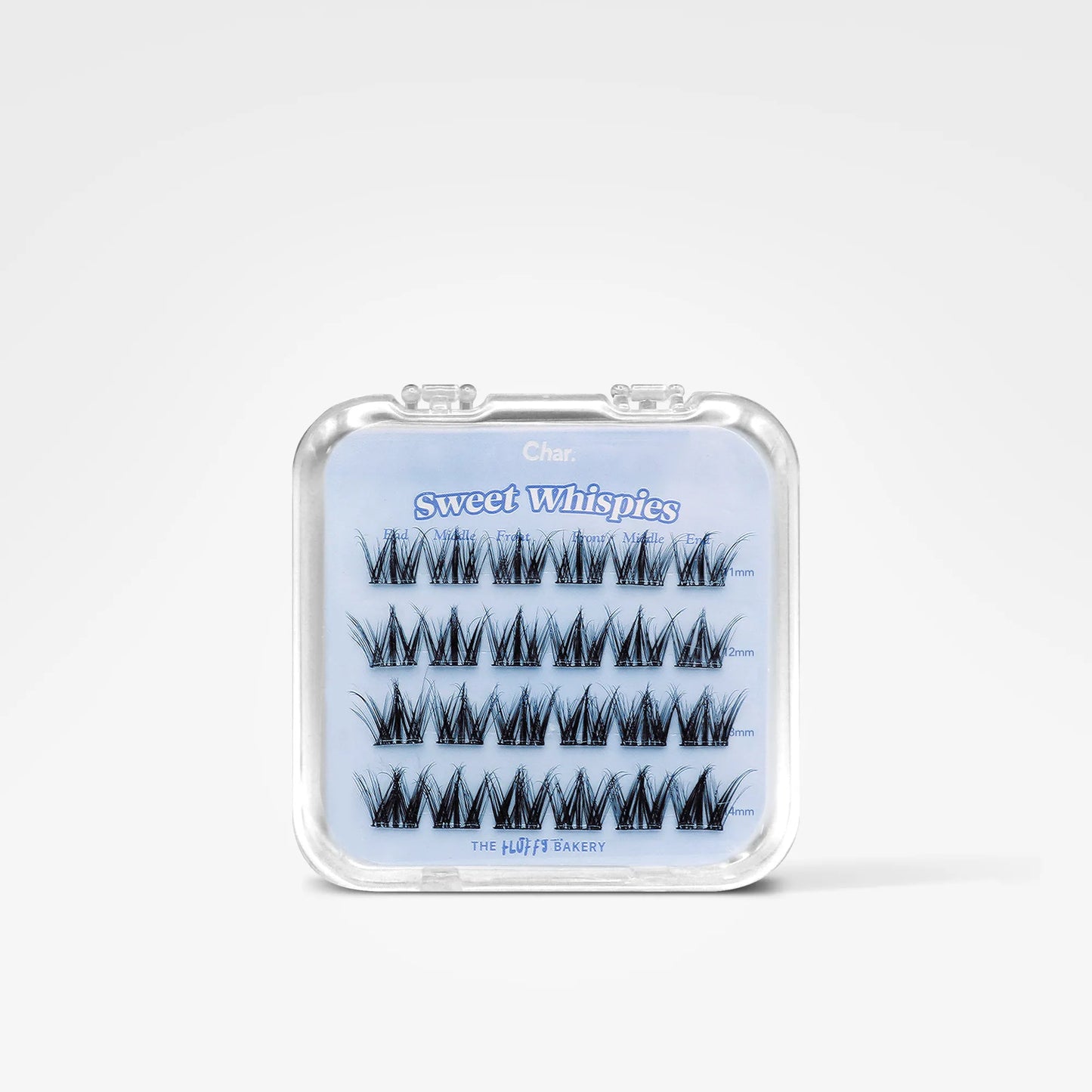 A clear plastic clamshell case containing five pairs of black false eyelashes on a light blue backing card labeled 'Sweet Whispers' and 'The Beauty Bank.'.