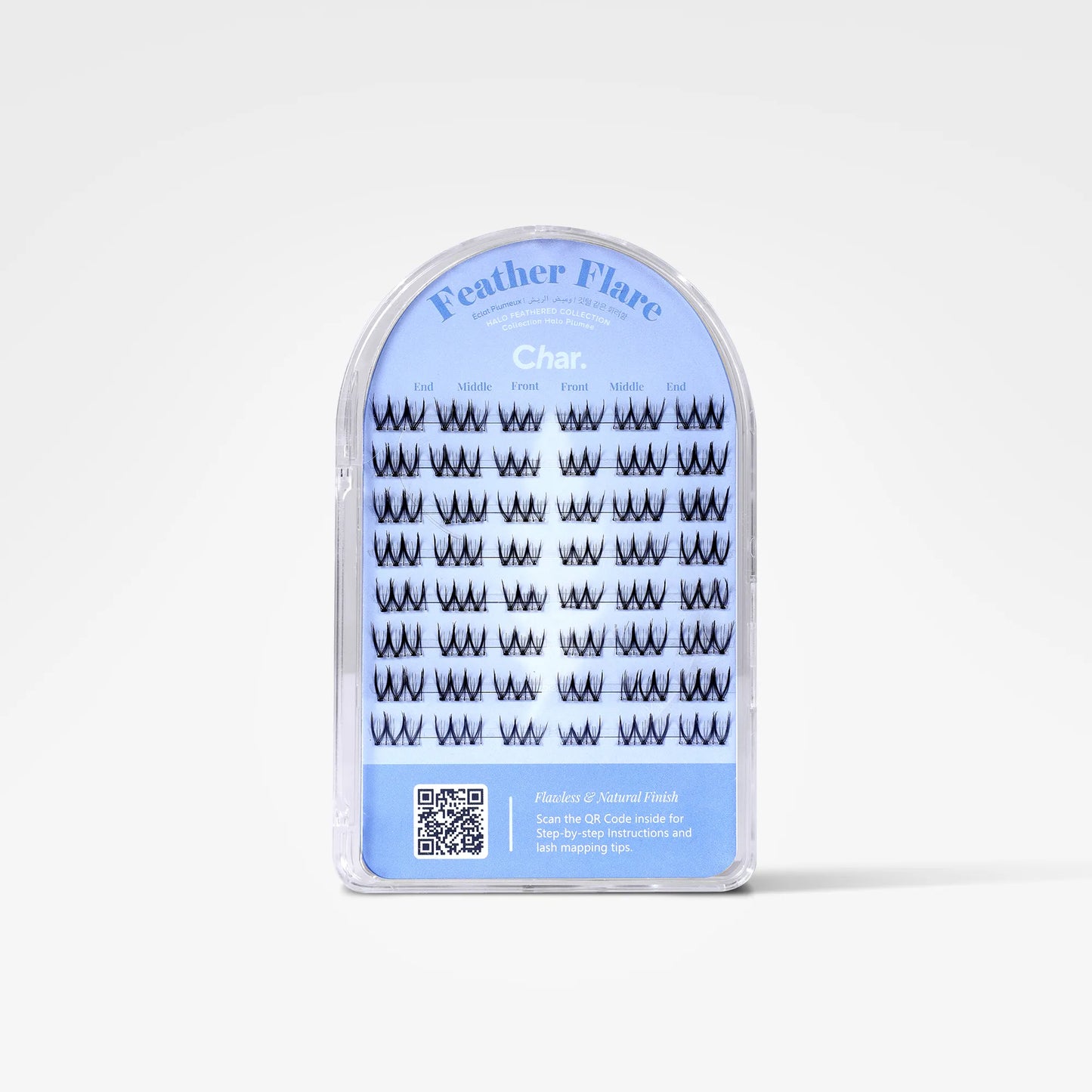 A package of Feather Flare false eyelashes in the shade Charcoal, shown in a clear plastic arch-shaped case with a light blue label.