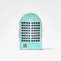 A package of Fluff Belle false eyelashes in the shade Char., shown in a clear arched plastic case with a mint green label on a white background.