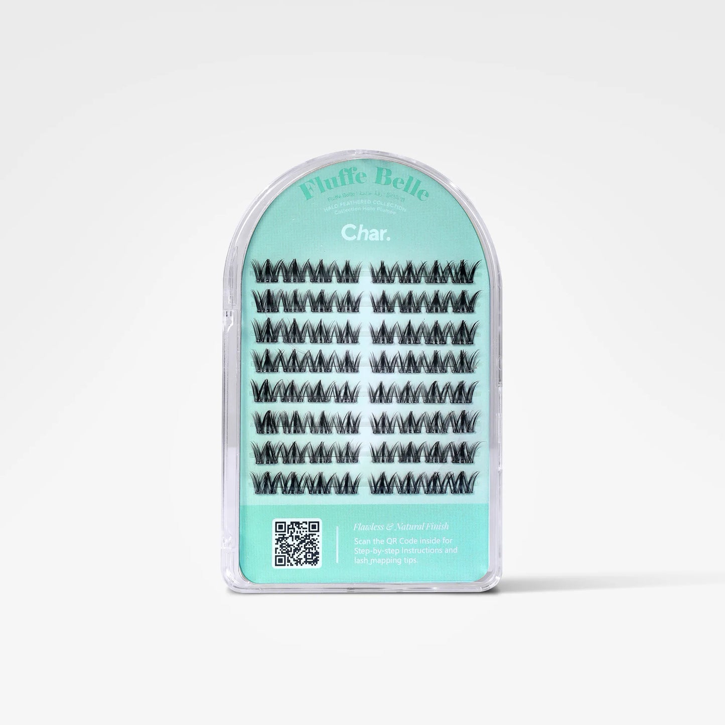 A package of Fluff Belle false eyelashes in the shade Char., shown in a clear arched plastic case with a mint green label on a white background.