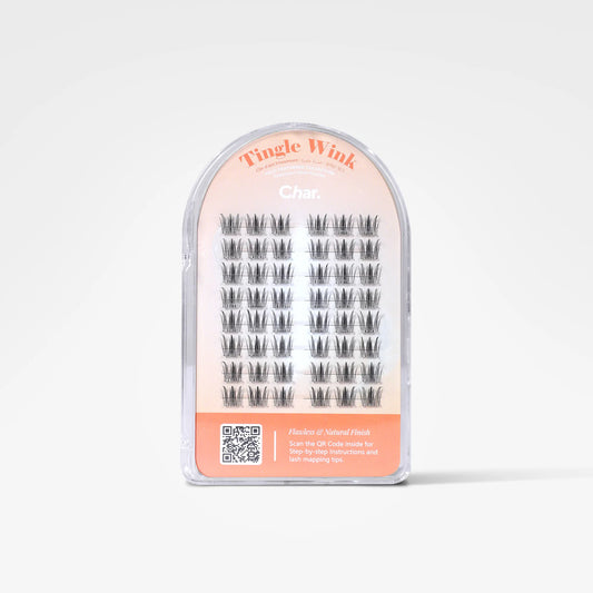A package of false eyelash clusters in a clear plastic dome case with a peach and white backing card. The card reads 'Tingle Wink' and 'Char.