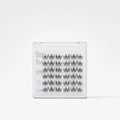 A clear plastic tray containing multiple rows of black false eyelash clusters, shown on a clean white background. The packaging includes printed instructions and a purple 'Chic' logo.