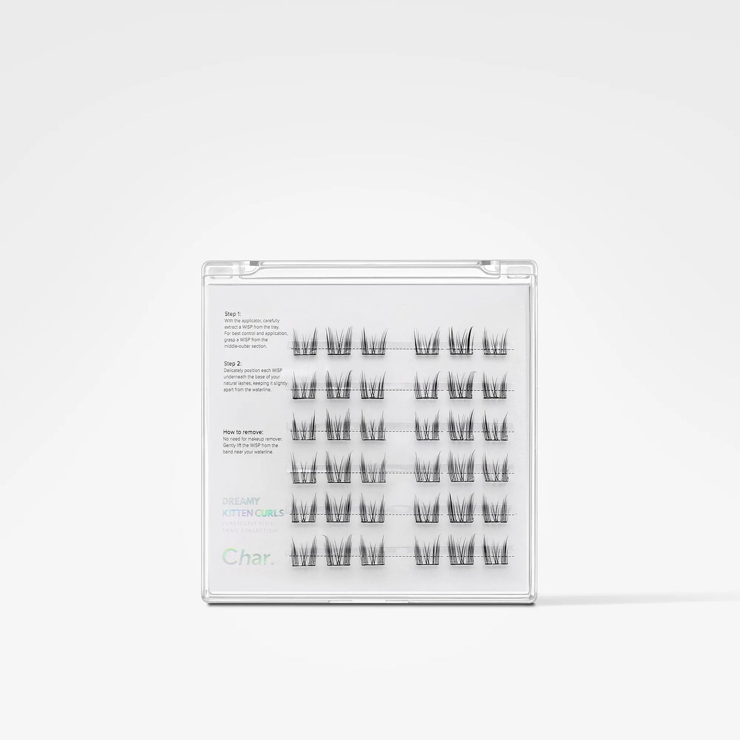 A clear plastic clamshell package containing multiple pairs of black false eyelashes arranged in rows on a white insert, photographed against a clean white background.